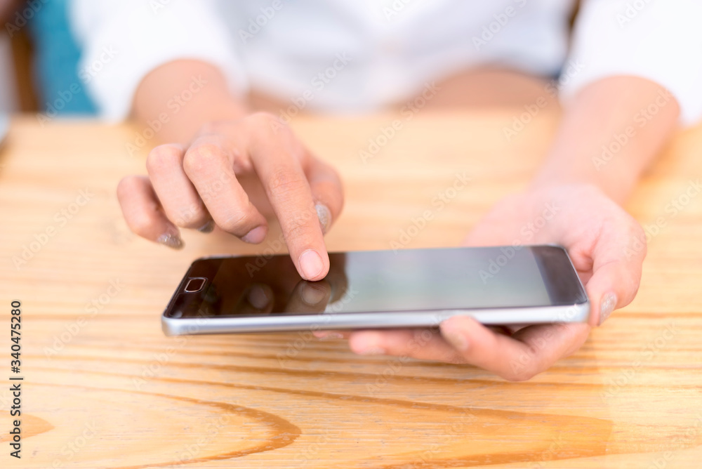 Selective focus, Hand hold and touch screen smart phone, Using finger touch screen mobile Selective focus, Hand hold and touch screen smart phone, Using finger touch screen mobile