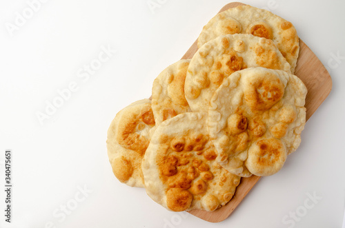 Navajo fried bread isolated on white background photo