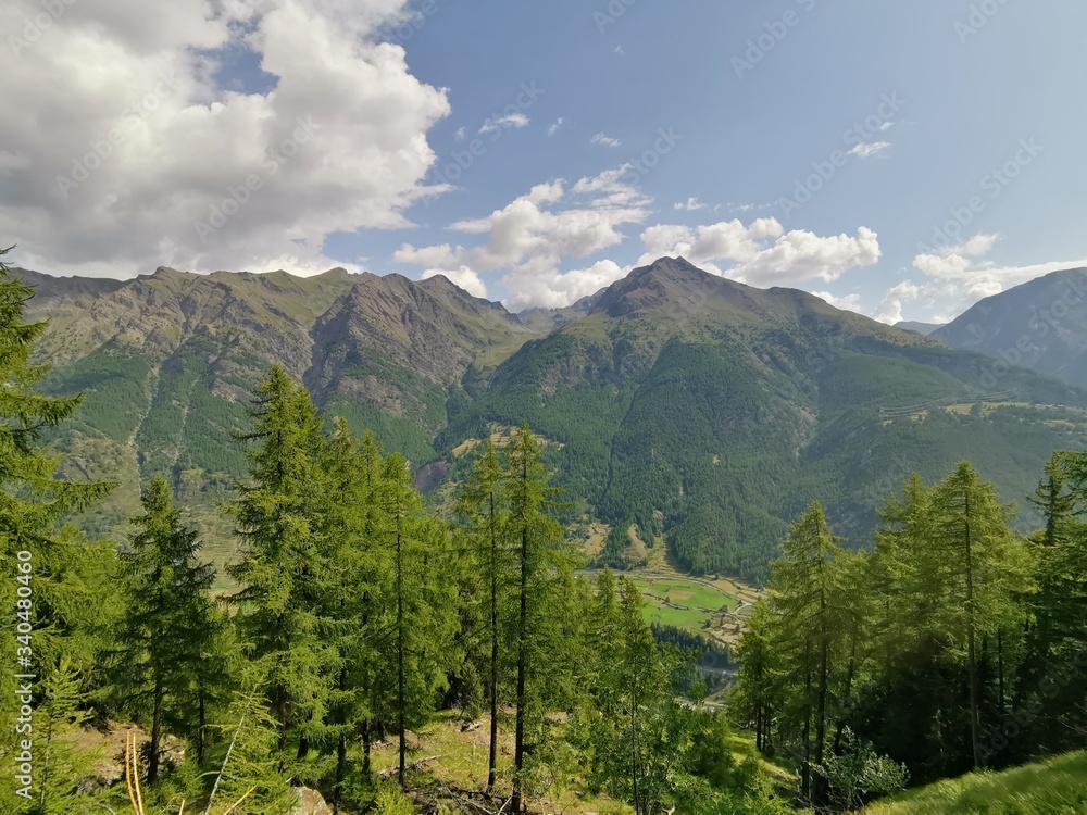 alps view in austria summer with big clouds and sunshine