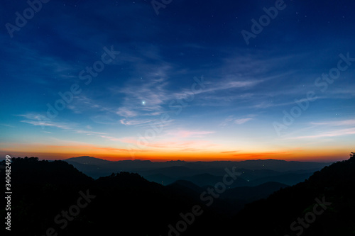 Majestic sunset sky over the mountains landscape