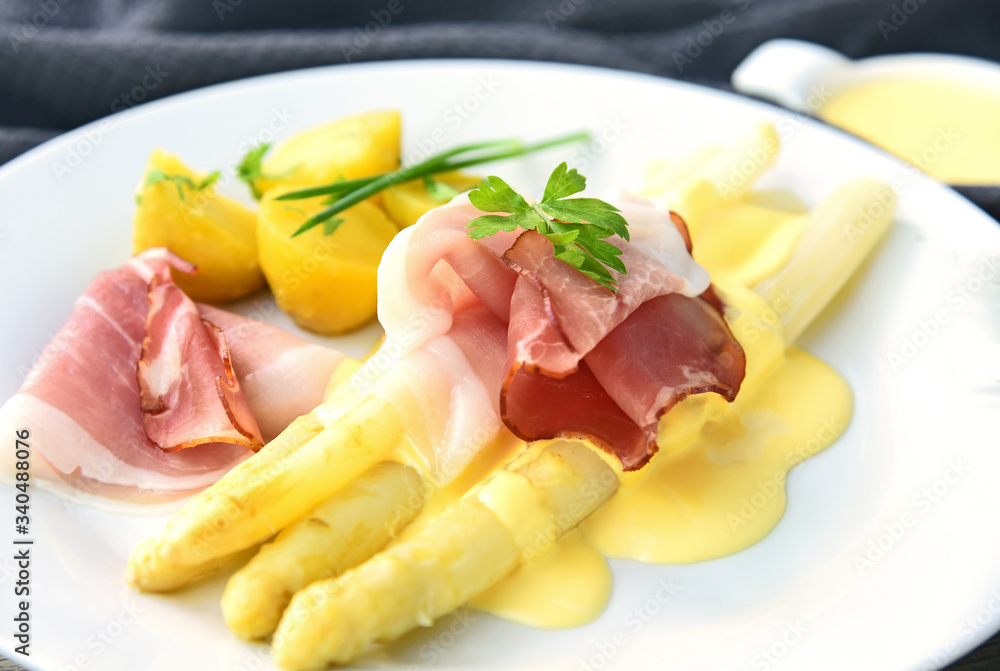 White Asparagus with Black Forest Ham and Hollandaise Sauce. Asparagus European menu. White Asparagus with Black Forest Ham and Hollandaise Sauce. Asparagus European menu.