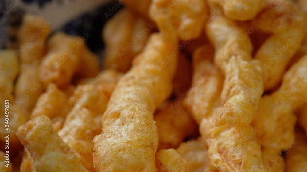 close up of potato chips in a bowl on table. close up of potato chips in a bowl on table.