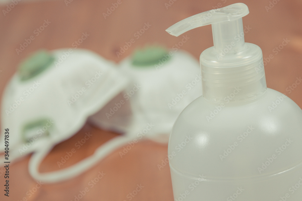 Alcohol disinfectant and protective mask N95. Coronavirus protection measures. Novel coronavirus outbreak. 2019-nCoV Alcohol disinfectant and protective mask N95. Coronavirus protection measures. Novel coronavirus outbreak. 2019-nCoV