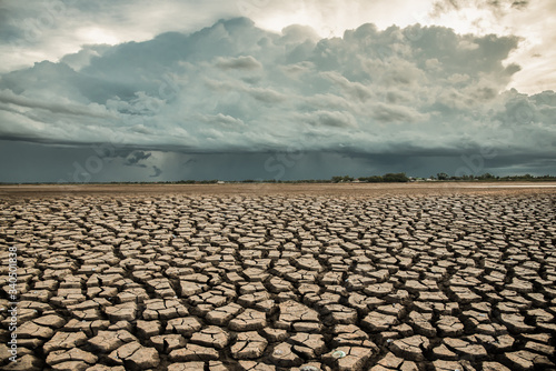Fototapet Climate change and drought land, Rainstorms are falling on the dry ground, Globa