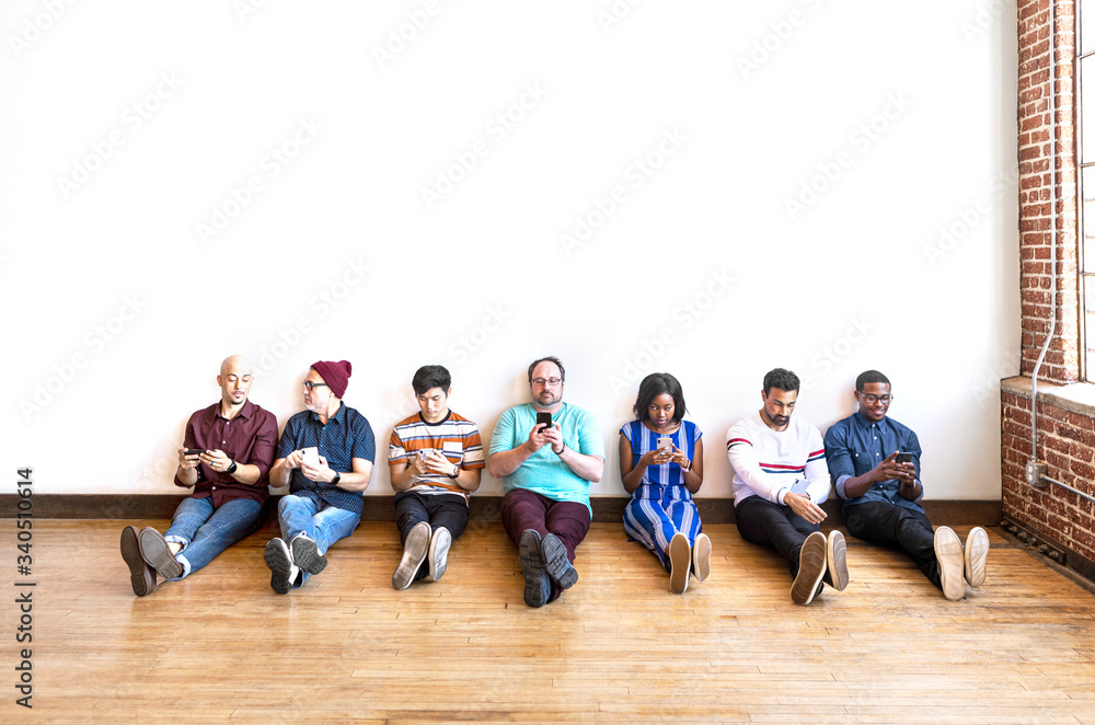 Fototapeta premium People sitting on the floor