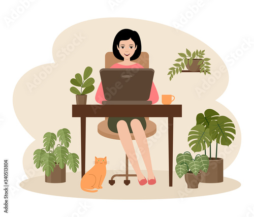 Female freelancer is working on a laptop. Distance job.Hugge