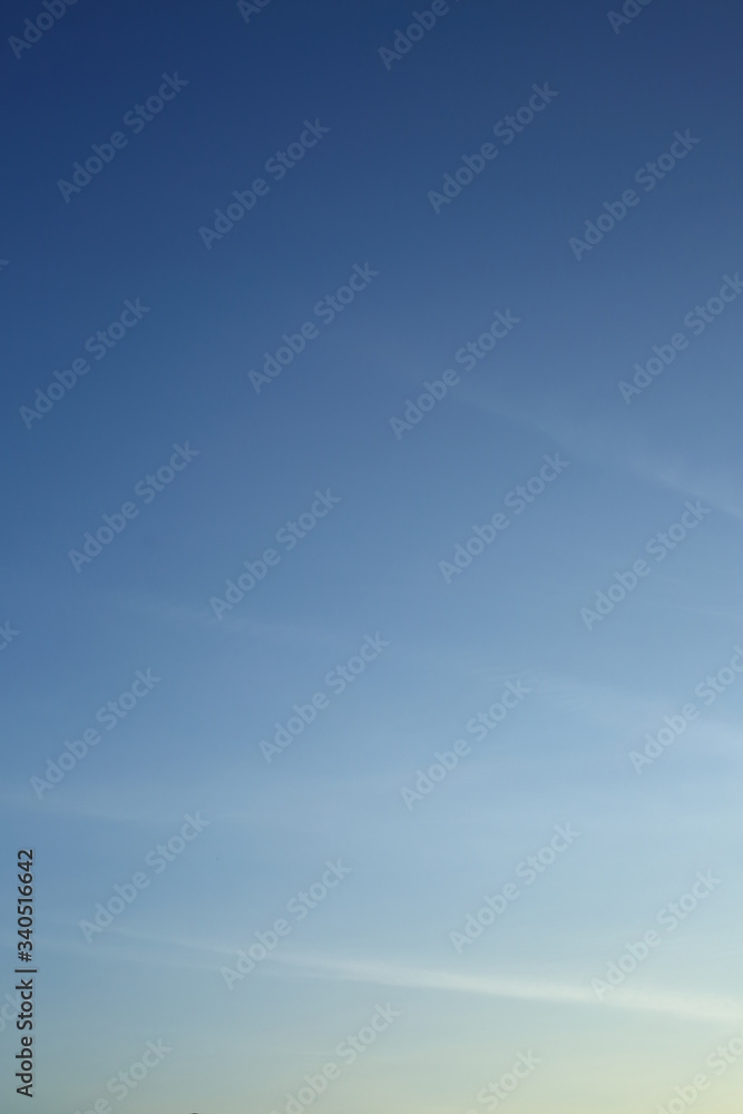 morning light on clear blue sky background