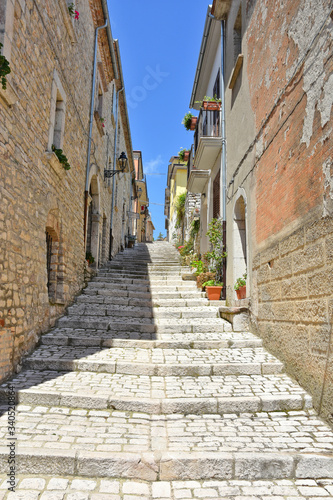 A small road between the old houses of Buonalbergo  a village in the province of Benevento