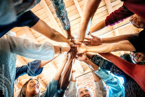 Tableau sur toile Group of people with their hands together