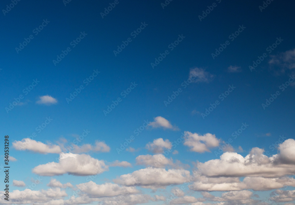 clouds swiftly swim through the blue sky of the day clouds swiftly swim through the blue sky of the day