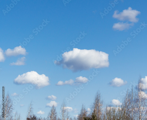 white clouds against blue sky © IURII