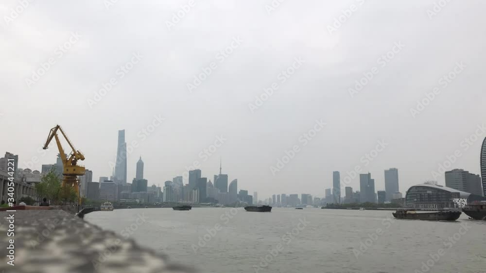 Time lapse video, the Huangpu River in Shanghai China, the cityscape of the Shanghai Lujiazui Financial District with skyscrapers and the river full of boat. The prosperity of the city. Time lapse video, the Huangpu River in Shanghai China, the cityscape of the Shanghai Lujiazui Financial District with skyscrapers and the river full of boat. The prosperity of the city.