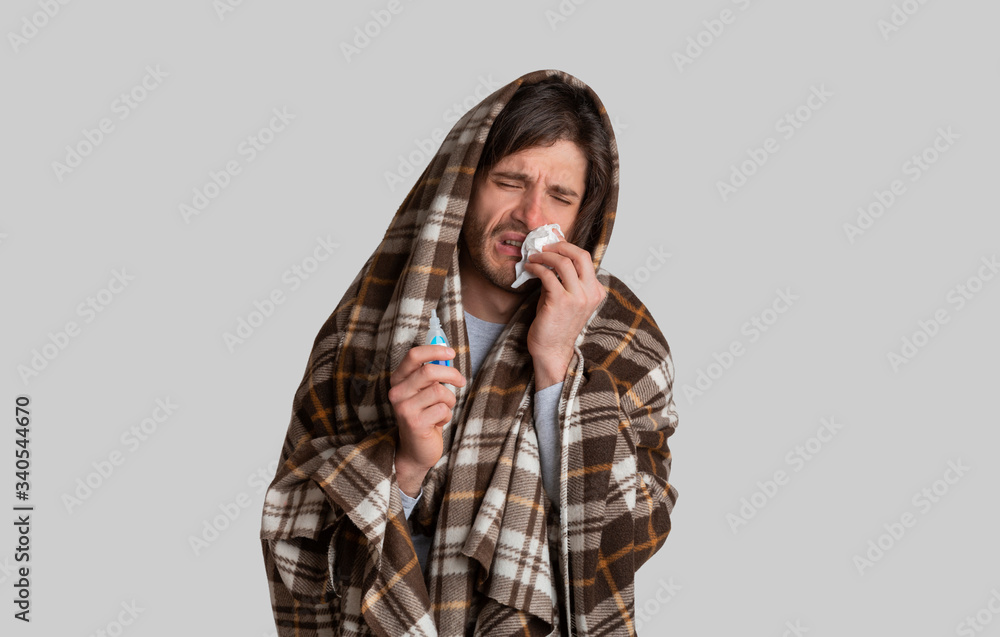Guy feels bad and wipes nose with napkin Guy feels bad and wipes nose with napkin