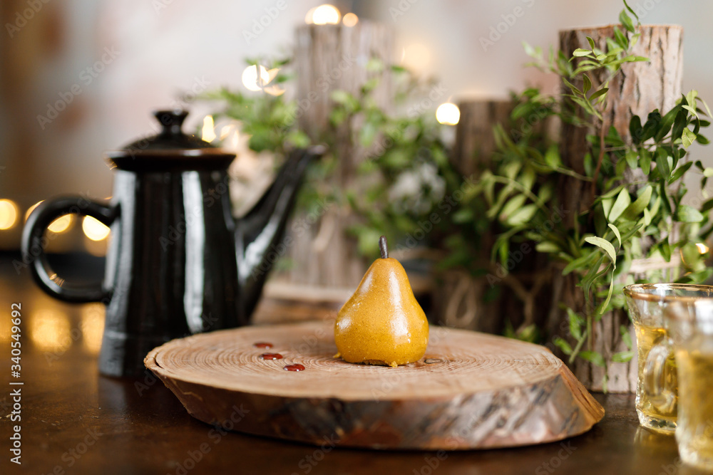 yellow pear cake on wooden background with bokeh lights yellow pear cake on wooden background with bokeh lights