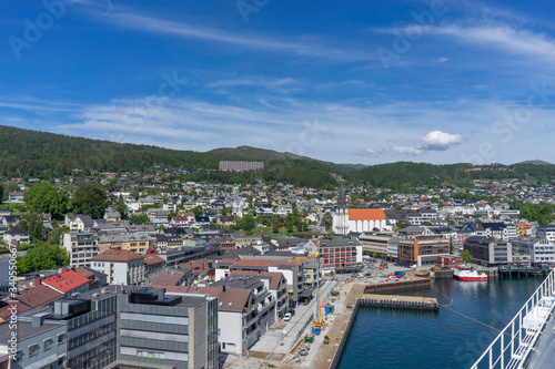 Seaside view of Molde, Norway. The city is located on the northern shore of the Romsdalsfjord and is nicknamed ‘The Town of Roses’. © Valmond