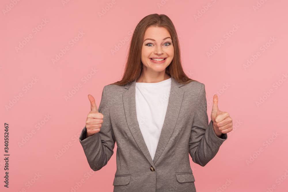 Like business project, well done! Portrait of positive expert, smart professional woman in business suit showing thumbs up, expressing support, approving startup idea. indoor studio shot, isolated Like business project, well done! Portrait of positive expert, smart professional woman in business suit showing thumbs up, expressing support, approving startup idea. indoor studio shot, isolated