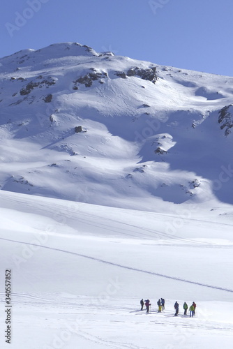 Bivio, Skitour auf den Piz dal Sasc. Blick auf Piz dal Sasc mit Tourenläufergruppe. photo