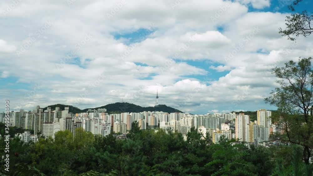 Time lapse shot of Seoul cityscape view from mountain, South Korea Time lapse shot of Seoul cityscape view from mountain, South Korea
