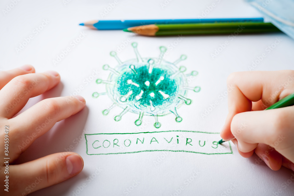 The child draws a coronavirus. Coronavirus. 2019 Novel Coronavirus, 2019-nCoV. The child draws a coronavirus. Coronavirus. 2019 Novel Coronavirus, 2019-nCoV.