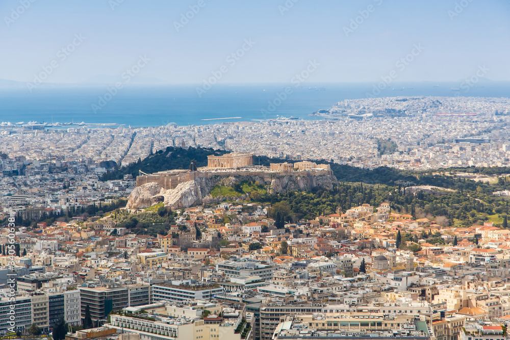 cityscape of Athens in day time with the Acropolis seen from Lycabettus Hill, the highest point in the city
