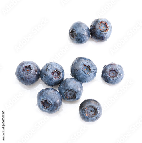 Group wet blueberries on white background. Top view. Isolated
