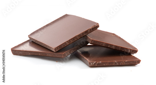 Bunch of chocolate pieces on white background