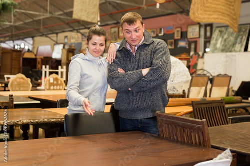 Couple visiting furniture store