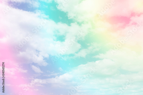 Cloud and sky with a pastel colored background.