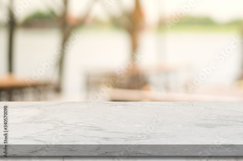 3D rendering, Empty Marble table top with light bokeh on blurred restaurant background