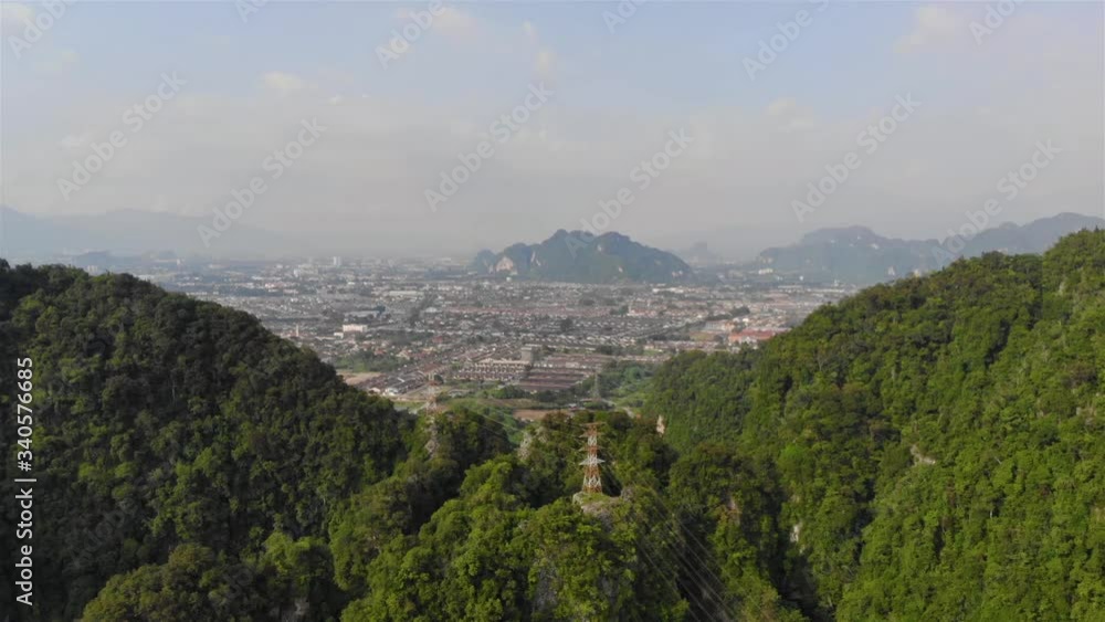 Top view from Cave Temple with mountains and city - ascending Top view from Cave Temple with mountains and city - ascending