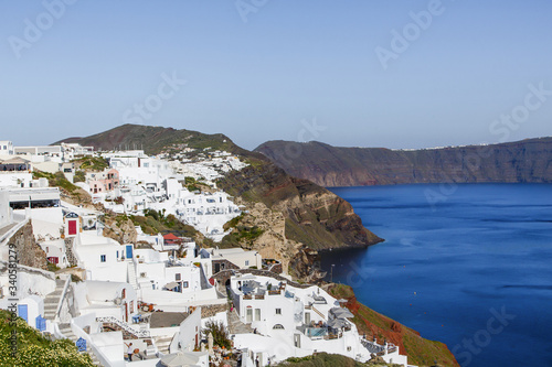 Fototapeta Naklejka Na Ścianę i Meble -  Beautiful view of famous romantic white town in Santorini Island, Greece