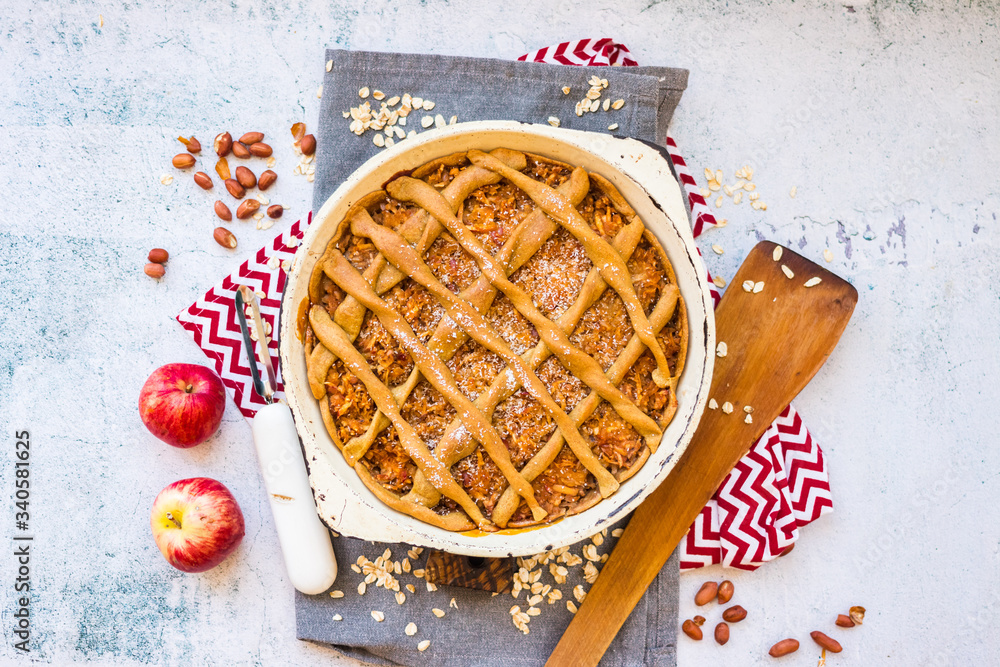 Apples fruits baked pastry pigtail pie or cake, tart. Sweet vegan non diary breakfast crumble dessert.