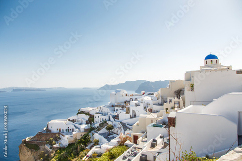 Papier peint Beautiful view of famous romantic white town in Santorini Island, Greece