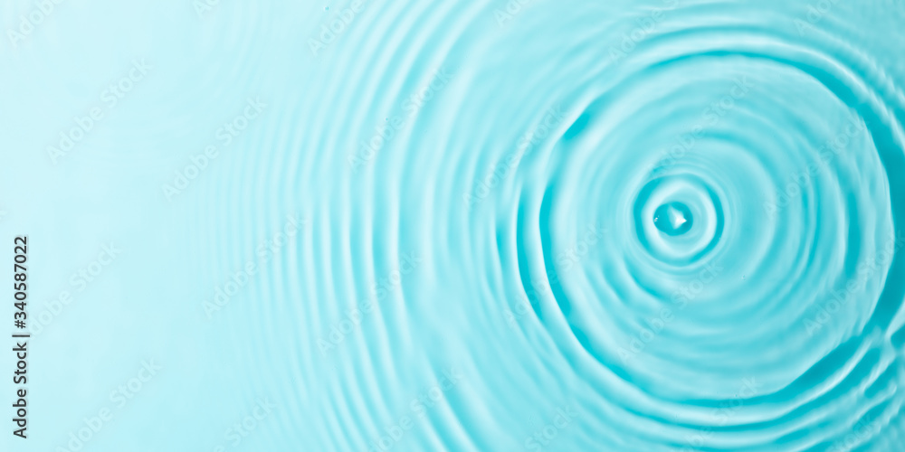 Water background. Blue water texture, surface of blue swimming pool. Spa concept background. Flat lay, top view, copy space, banner Water background. Blue water texture, surface of blue swimming pool. Spa concept background. Flat lay, top view, copy space, banner