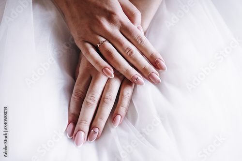beautiful girl hands during wedding day