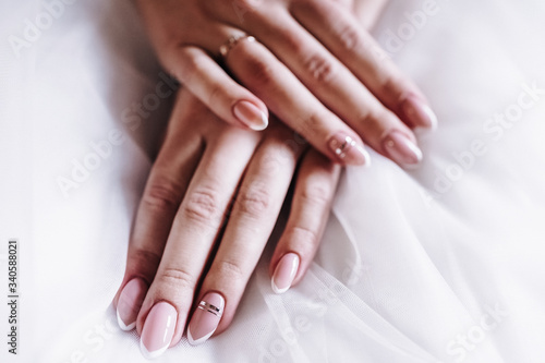 beautiful girl hands during wedding day