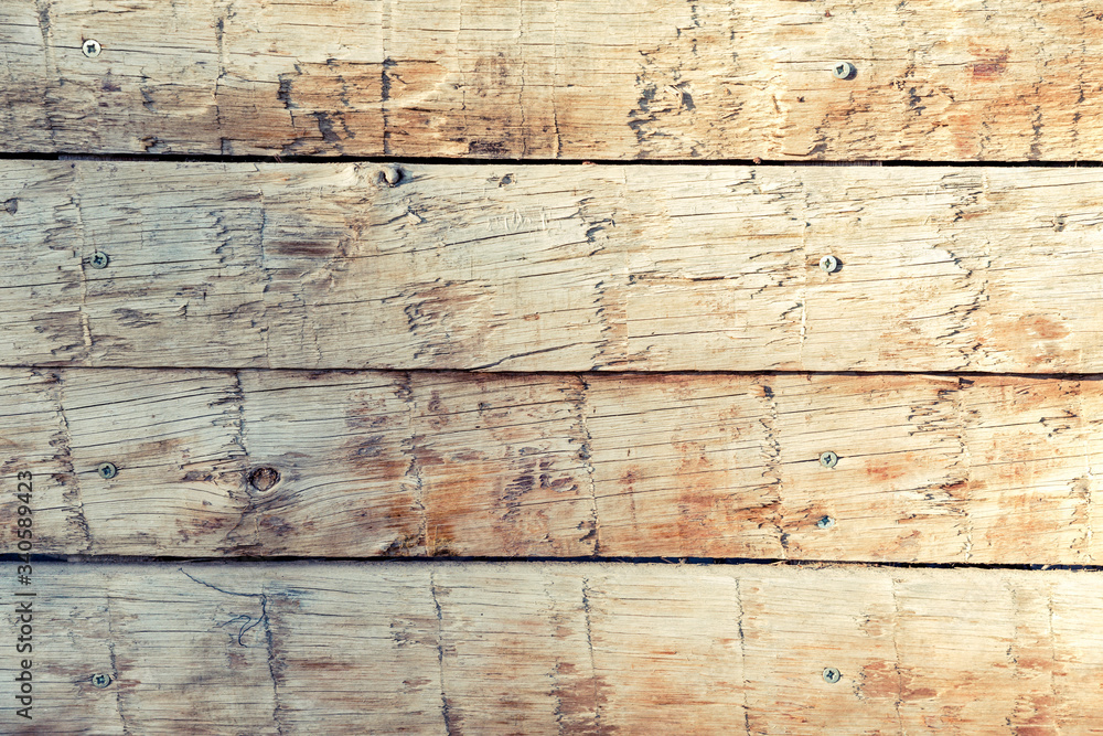wooden boards fixed with screws for confinement. wood background wooden boards fixed with screws for confinement. wood background