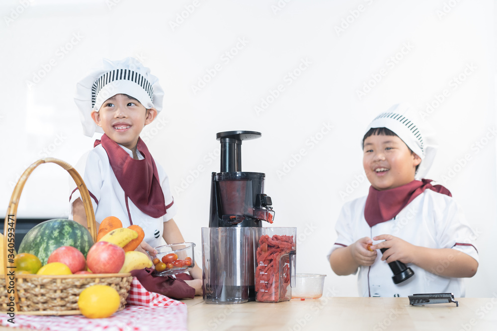 Brothers make vegetable juice, with carrot apple orange cranberry and mango. Brothers make vegetable juice, with carrot apple orange cranberry and mango.