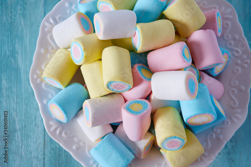 colorful marshmallow on wooden surface