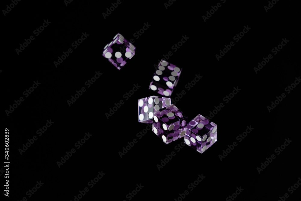 Purple Casino dices over black background