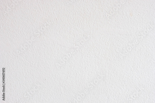The house wall is painted in white.
