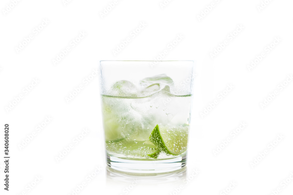 Rum based cocktail caipirinha (variation of cuba libre) on the white background. Selective focus. Shallow depth of field.
Rum based cocktail caipirinha (variation of cuba libre) on the white background. Selective focus. Shallow depth of field.