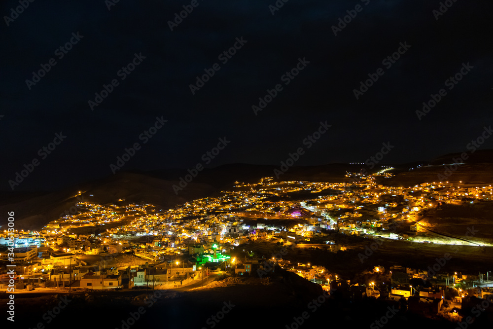 night panorama of town Wadi Musa, the closest town to the Petra, Jordan