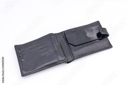 Black leather mens wallet with many pockets and compartments for credit and discount cards. Classical model. Wallet on white background.