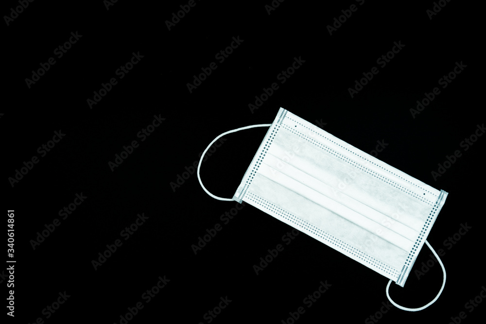 Antivirus mask taken on a black background Antivirus mask taken on a black background