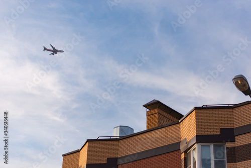 The plane over the apartment block. Glissada passes over high-rise buildings. Noise from planes prevents sleep