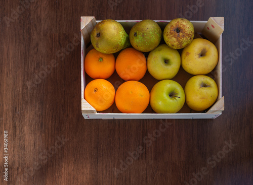 overhead view of box with assorted fruit