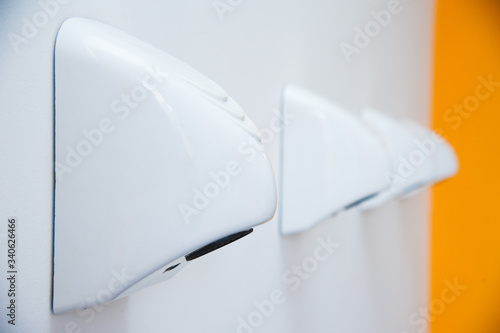 Automatic hand dryers in public toilet
