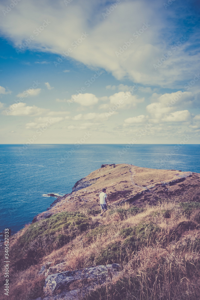 Man in the Tintagel Castle,Ruins,SW Coastal Path,Tintagel Parish Church,Views from the Camelot Hotel,Tintagel,Cornwall,Great Britain