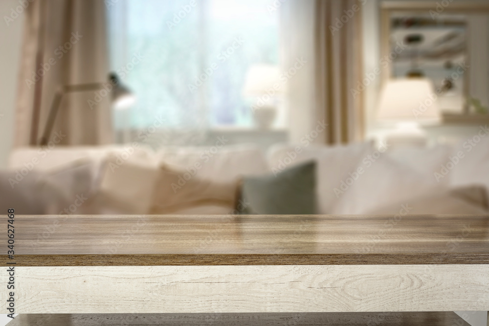 Desk of free space and blurred window sill in home interior Desk of free space and blurred window sill in home interior